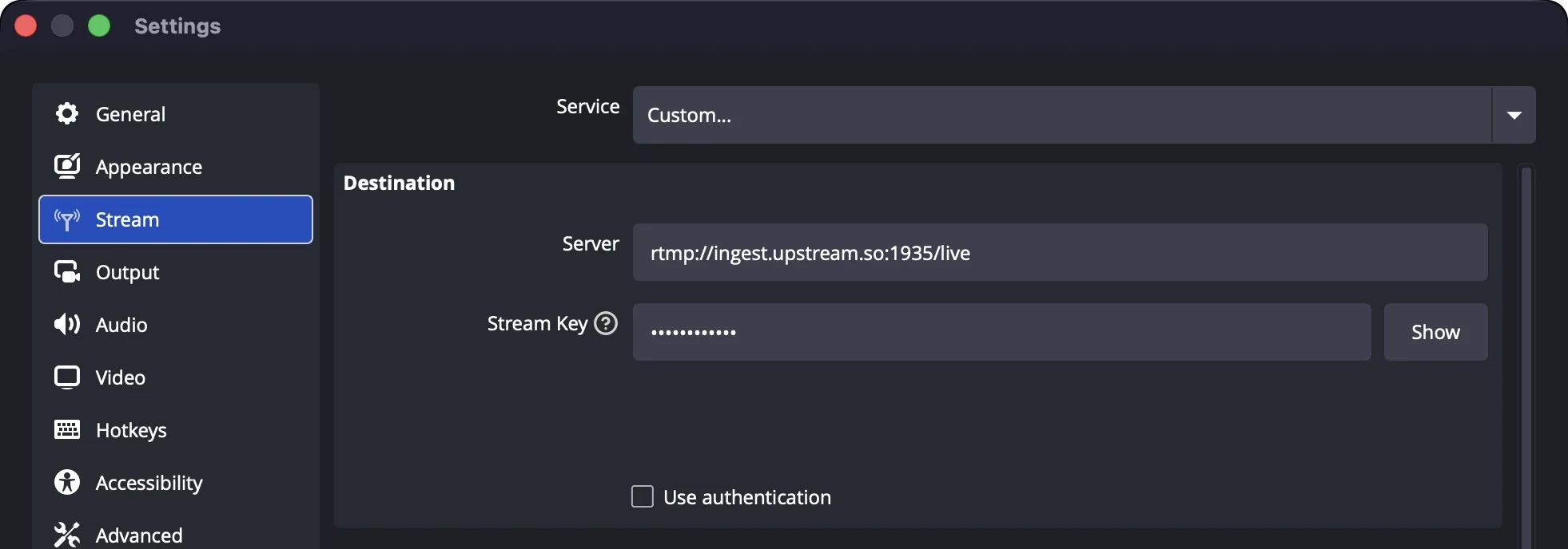 OBS Studio Settings, Stream tab: Service set to Custom, Server set to rtmp://ingest.upstream.so:1935/live and a hidden Stream Key